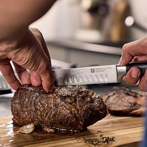 Zwilling J.A. Henckels Twin Four Star 10-Inch High-Carbon Stainless-Steel Granton Roast Beef Slicer Zwilling JA Henckels Twin Four Star 10 Inch High Carbon Stainless Steel Granton Roast Beef Slicer